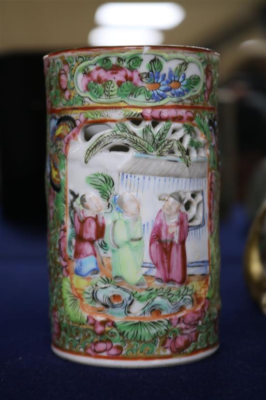 A Japanese Kutani porcelain lion dog candlestick, enamelled and gilt decoration and a Canton vase candlestick height 10cm